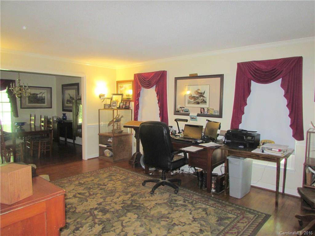 1515 Mallard Bay Road York, SC 29745 - Photo 15 of 24 a view of a livingroom with workspace and a couch