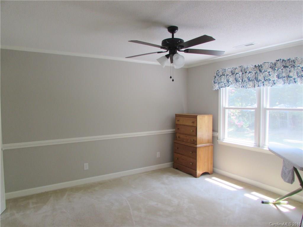 1515 Mallard Bay Road York, SC 29745 - Photo 18 of 24 an empty room with windows and fan view