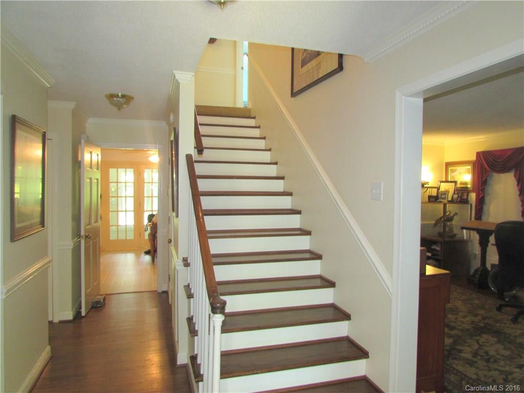 1515 Mallard Bay Road York, SC 29745 - Photo 4 of 24 a view of entryway and hall with wooden floor