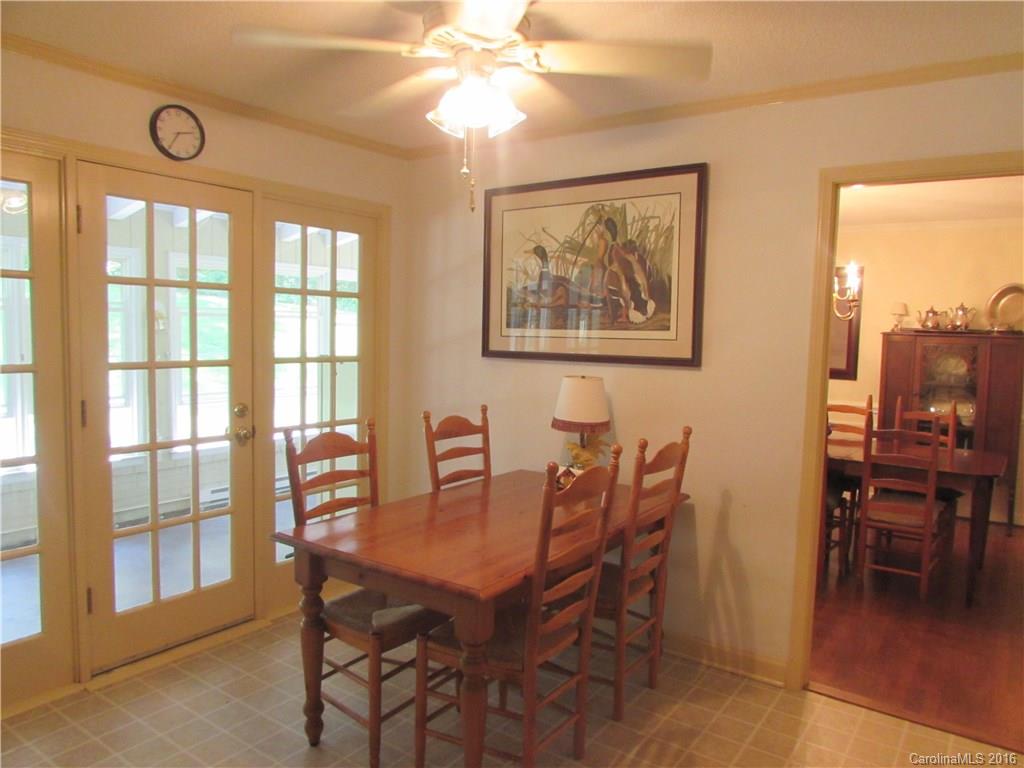 1515 Mallard Bay Road York, SC 29745 - Photo 7 of 24 a view of a dining room with furniture and chandelier