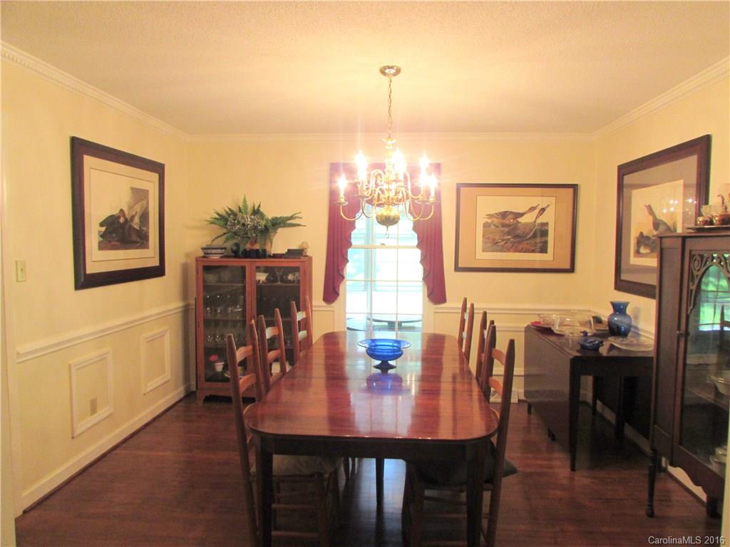 1515 Mallard Bay Road York, SC 29745 - Photo 8 of 24 a view of a dining room with furniture window and wooden floor