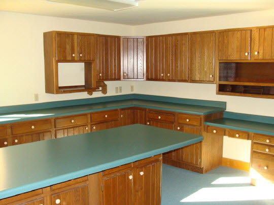 20813 Streit Road Harvard, IL 60033 - Photo 9 of 11 a kitchen with stainless steel appliances a sink dishwasher and cabinets with wooden floor