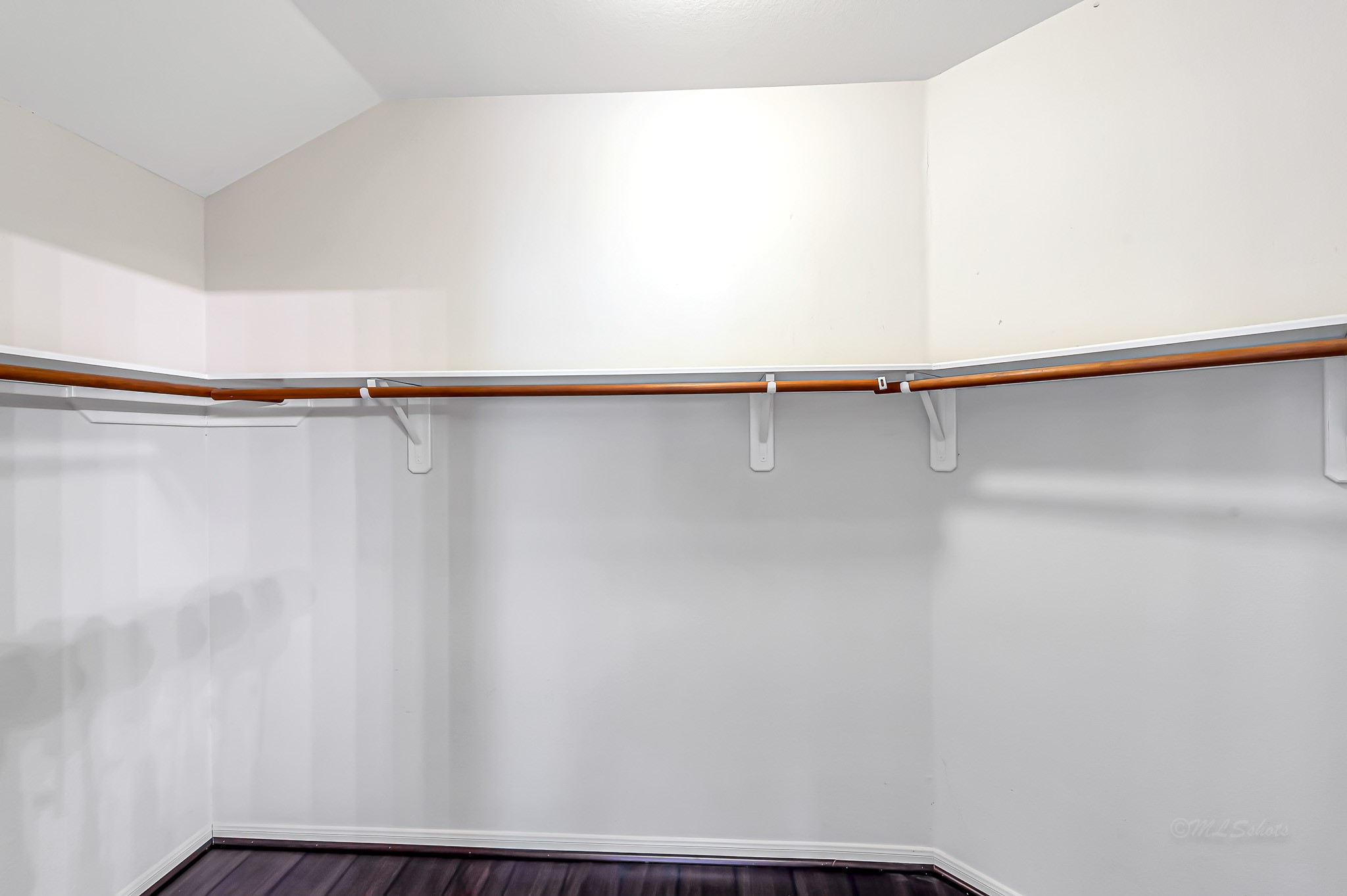 1602 Rustic Hollow Lane Katy, TX 77450 - Photo 24 of 48 Spacious walk in closet with laminate floors.