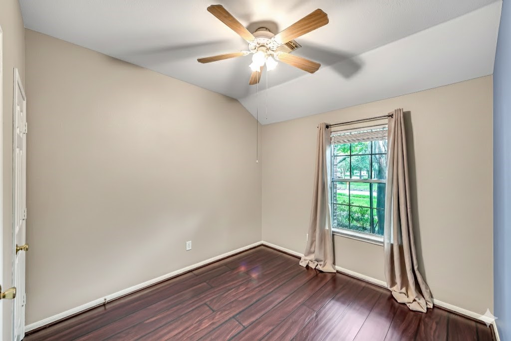 1602 Rustic Hollow Lane Katy, TX 77450 - Photo 25 of 48 Secondary bedroom with ceiling fan.