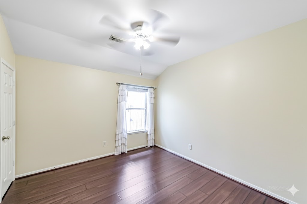 1602 Rustic Hollow Lane Katy, TX 77450 - Photo 26 of 48 Secondary bedroom with ceiling fan.