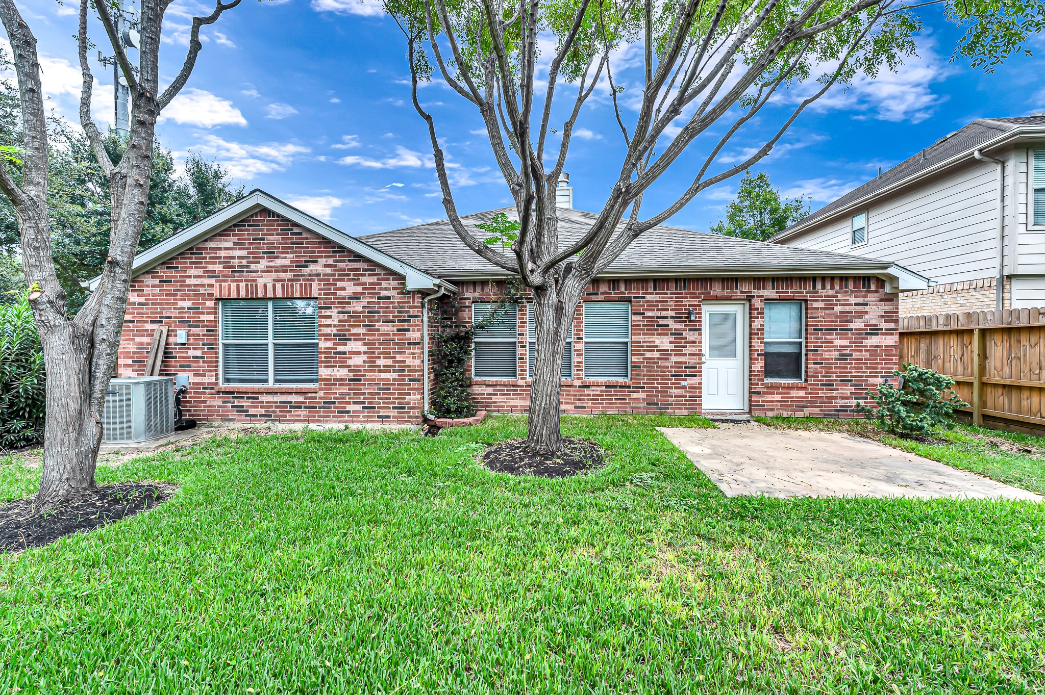 1602 Rustic Hollow Lane Katy, TX 77450 - Photo 32 of 48 Mature trees with spaces for your kids to play.