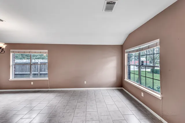 a view of an empty room with window