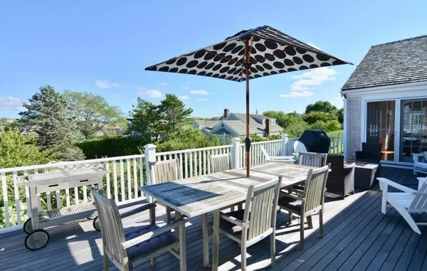 a view of a table and chairs in patio