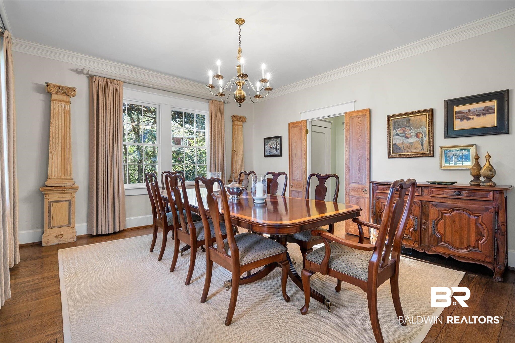 2 Westgate Road Mobile, AL 36608 - Photo 11 of 63 Dining room featuring dark wood-type flooring, a chandelier, and ornamental molding