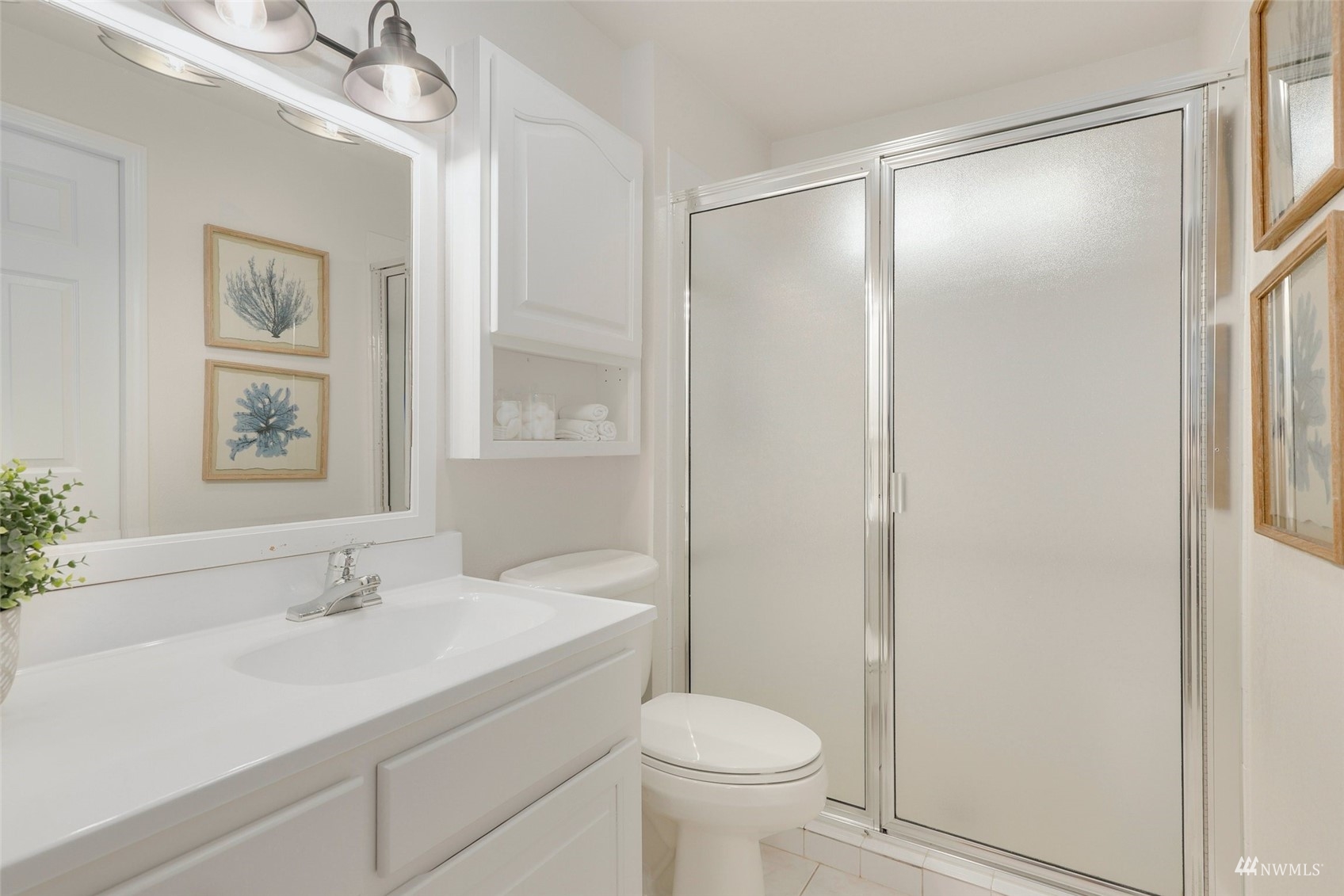 22019 2nd Place West Bothell, WA 98021 - Photo 18 of 40 a bathroom with a sink toilet and shower