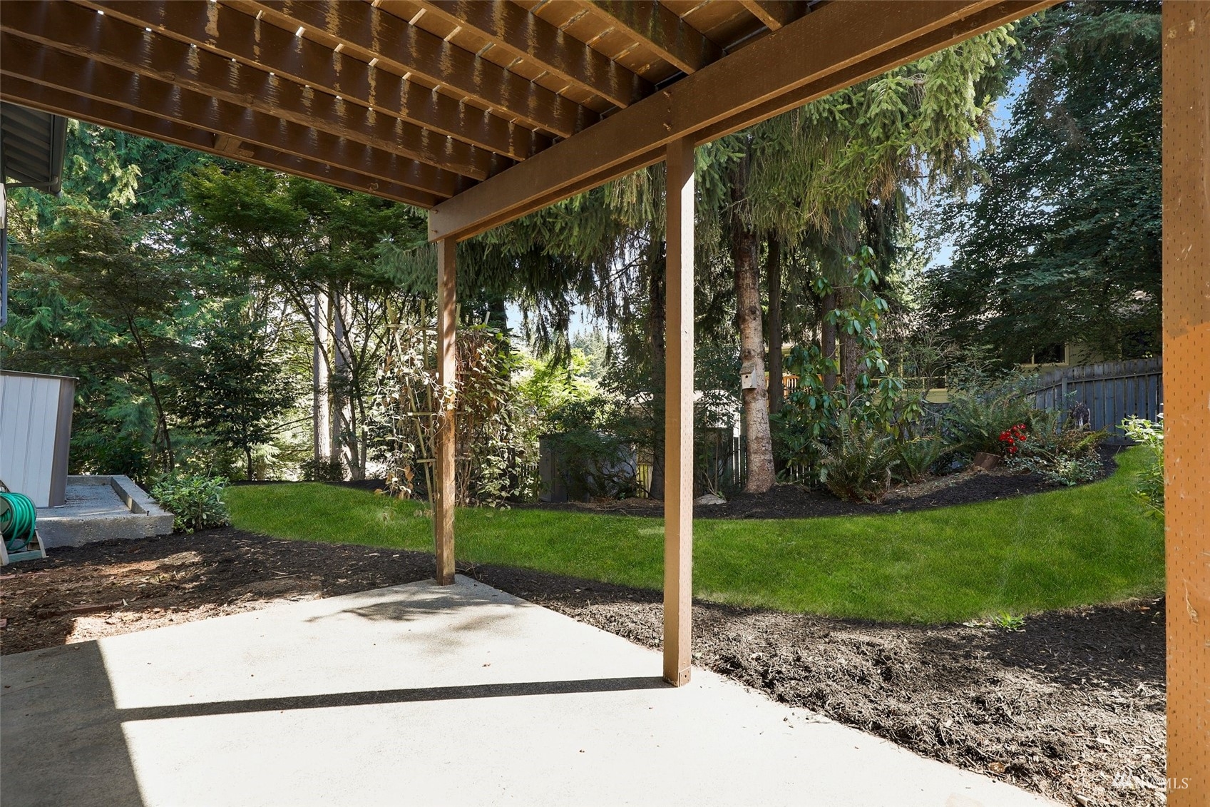 22019 2nd Place West Bothell, WA 98021 - Photo 36 of 40 a view of a patio with a backyard