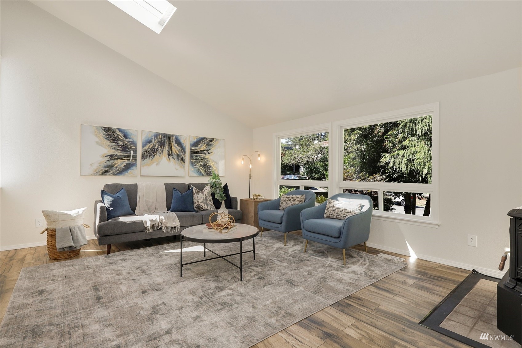 22019 2nd Place West Bothell, WA 98021 - Photo 4 of 40 a living room with furniture and a flat screen tv