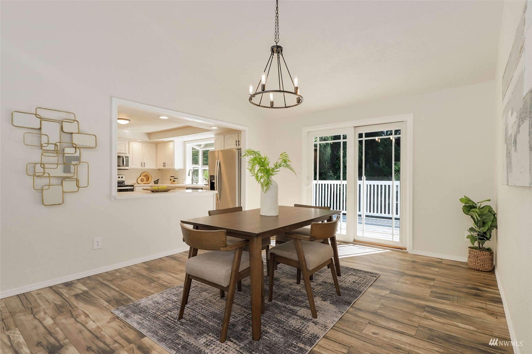22019 2nd Place West Bothell, WA 98021 - Photo 8 of 40 a view of a dining room with furniture and wooden floor