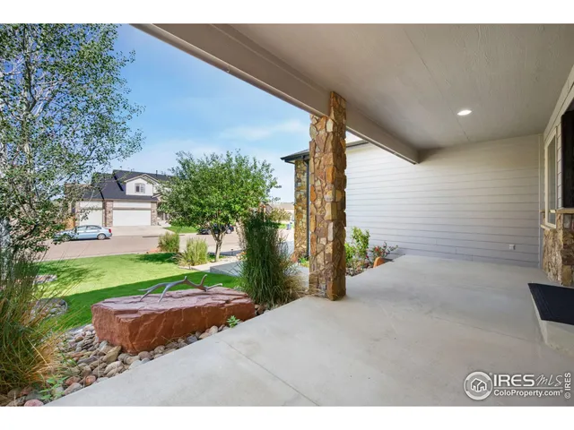 a dining room with a table and chairs
