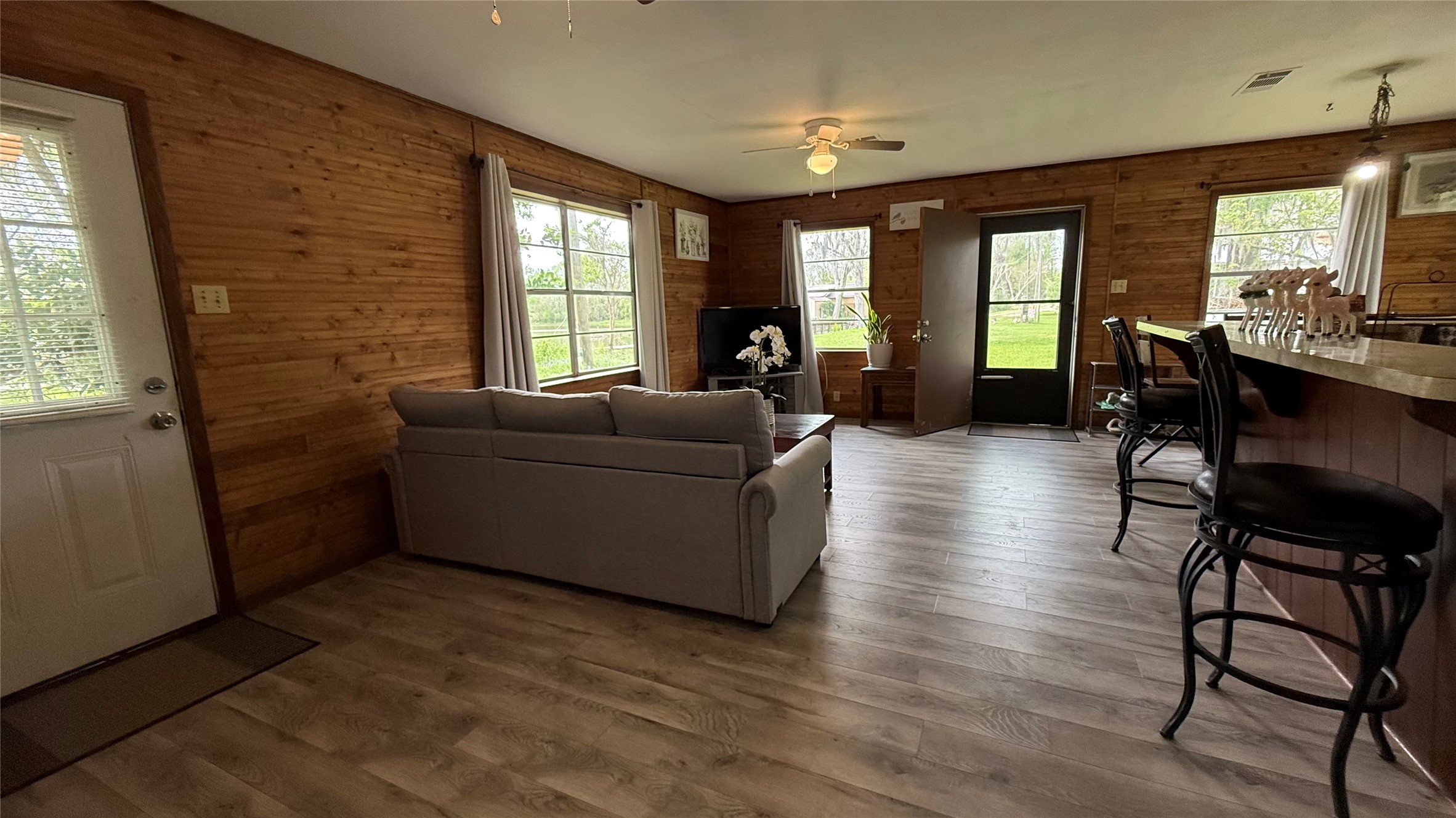 215 Weldon Livingston, TX 77351 - Photo 8 of 22 a living room with furniture and a large window