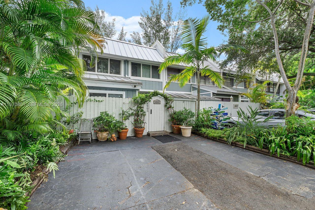 4905 Southwest 71st Place Miami, FL 33155 - Photo 24 of 37 a view of a garden with potted plants