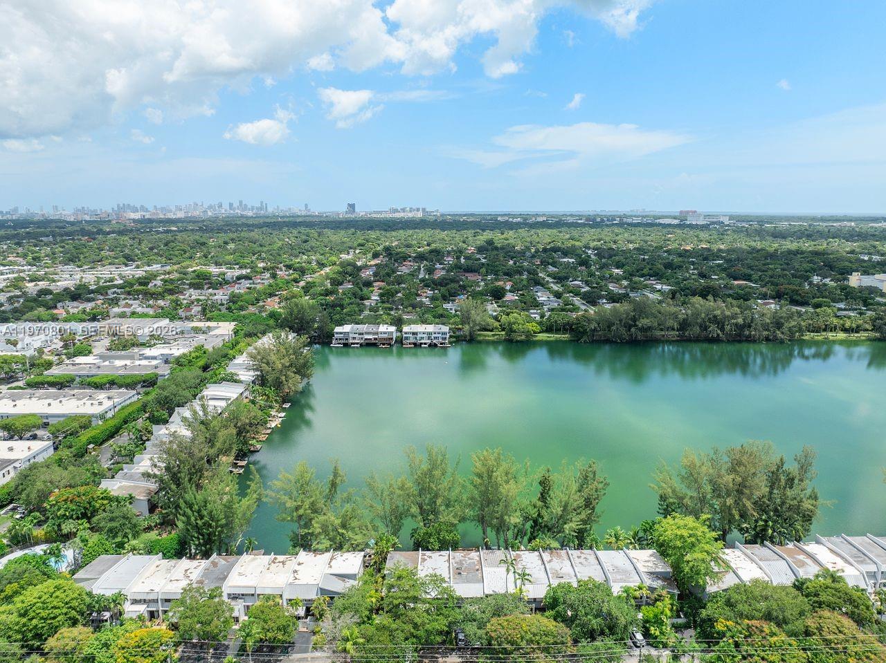 4905 Southwest 71st Place Miami, FL 33155 - Photo 35 of 37 an aerial view of residential houses with outdoor space and lake view