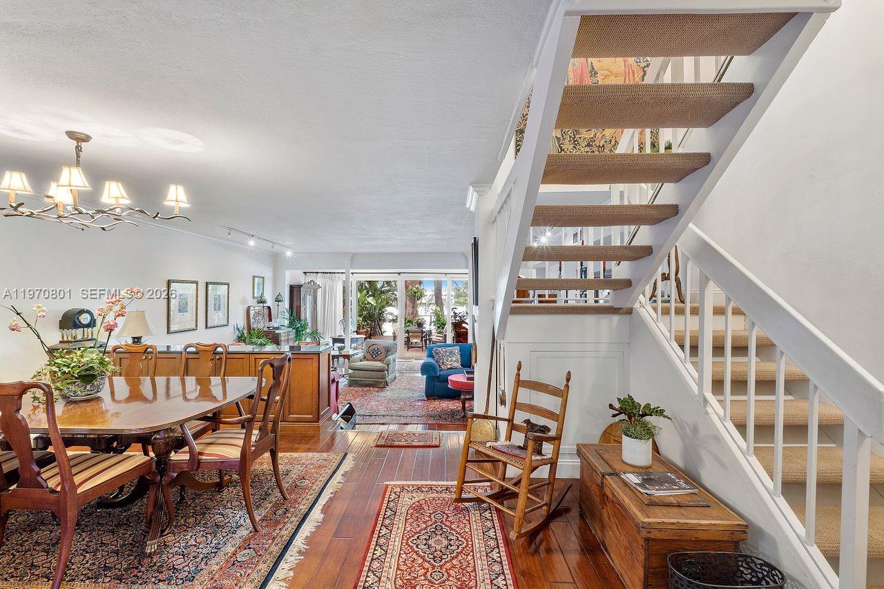 4905 Southwest 71st Place Miami, FL 33155 - Photo 7 of 37 a living room with furniture and a floor to ceiling window