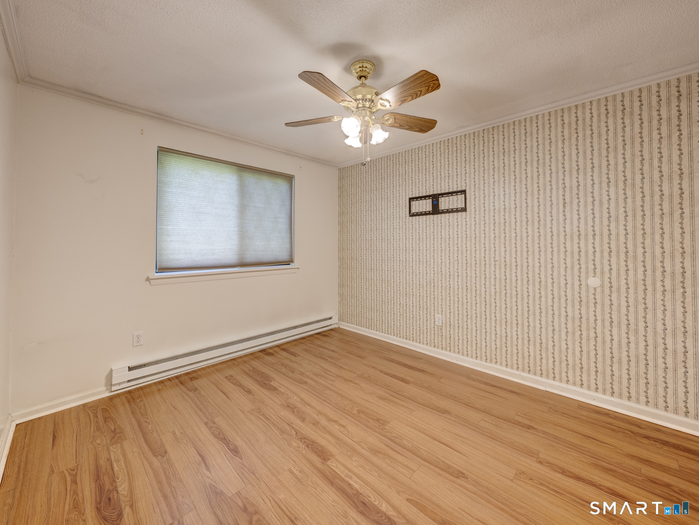 2 Branch Road, Unit 2C Thomaston, CT 06787 - Photo 16 of 26 wooden floor in an empty room with a window