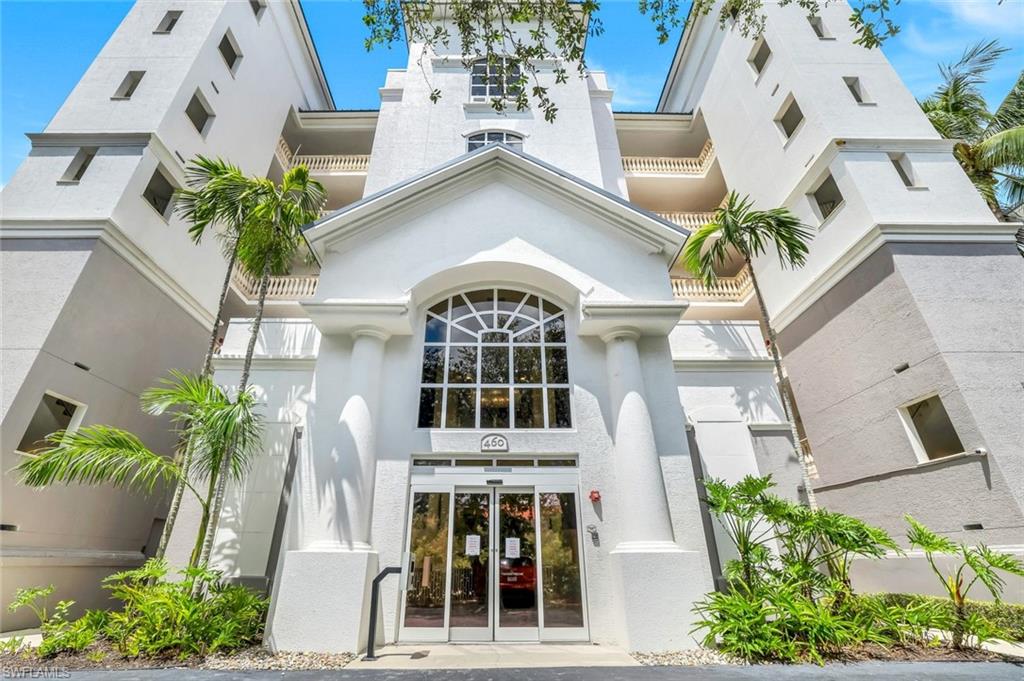 460 Launch Circle, Unit 202 Naples, FL 34108 - Photo 23 of 34 a view of a building with a entryway