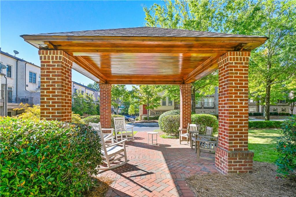 3635 East Paces Circle, Unit 1410 Atlanta, GA 30326 - Photo 46 of 68 a view of yard with patio