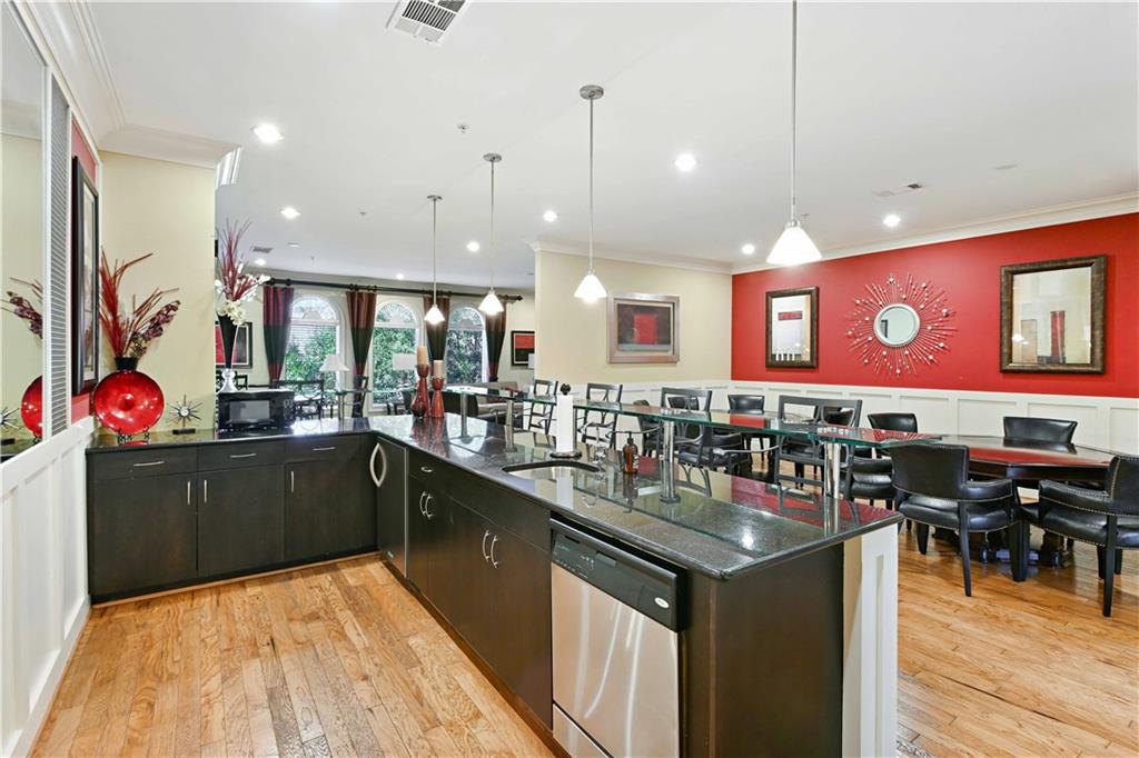 3635 East Paces Circle, Unit 1410 Atlanta, GA 30326 - Photo 54 of 68 a kitchen with lots of counter top space