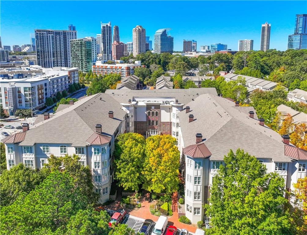 3635 East Paces Circle, Unit 1410 Atlanta, GA 30326 - Photo 62 of 68 a view of a city with tall buildings