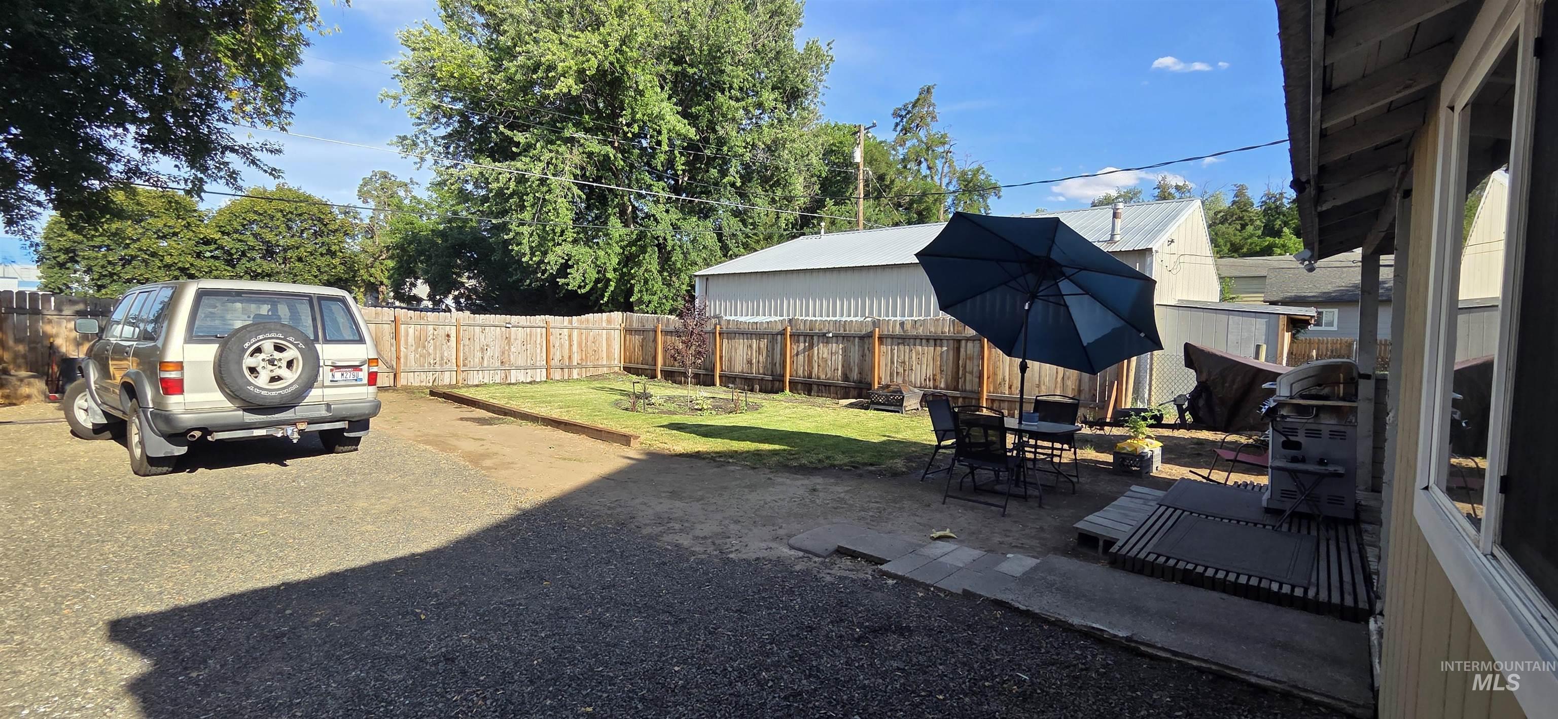 509 16th Street Lewiston, ID 83501 - Photo 9 of 10 Fenced backyard featuring a patio area
