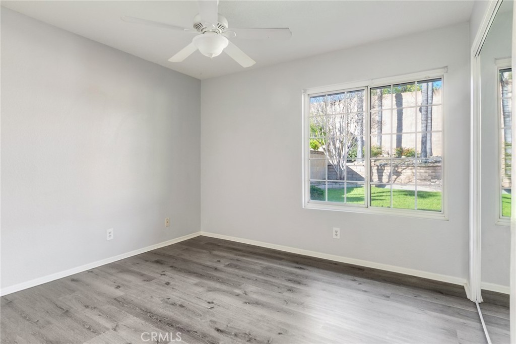 8358 Garden Street Rancho Cucamonga, CA 91701 - Photo 15 of 28 an empty room with a window and ceiling fan