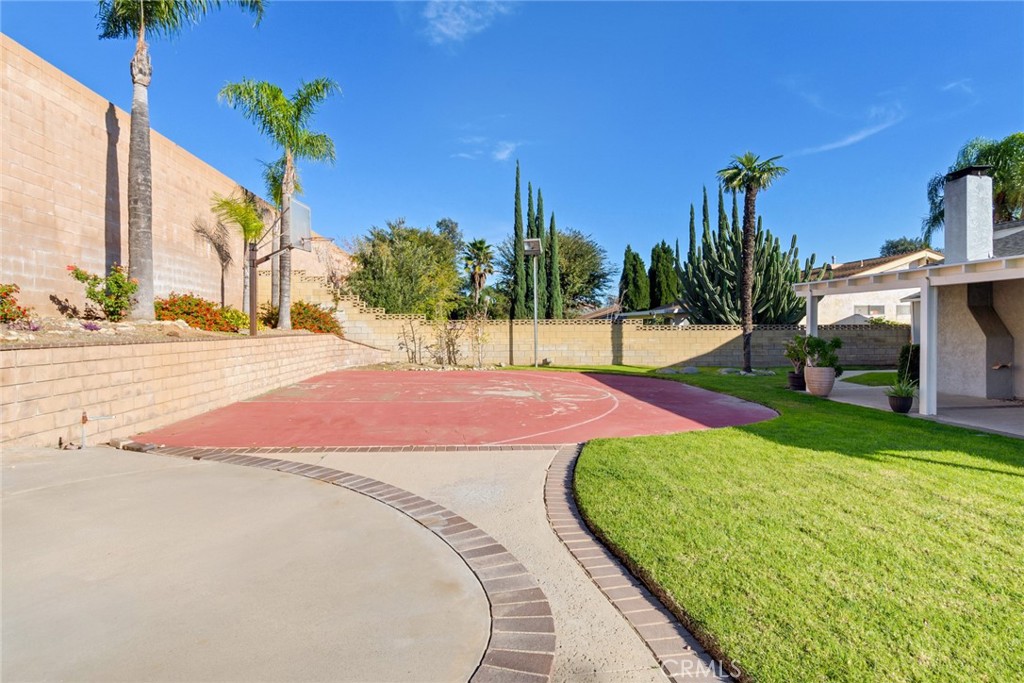 8358 Garden Street Rancho Cucamonga, CA 91701 - Photo 23 of 28 a view of a backyard with palm trees