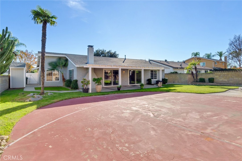 8358 Garden Street Rancho Cucamonga, CA 91701 - Photo 24 of 28 a front view of house with yard and green space