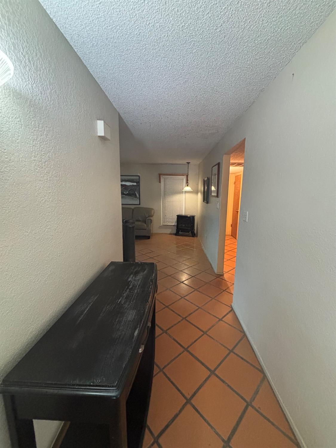 1225 Pontiac Avenue Clovis, CA 93727 - Photo 3 of 18 a view of empty room with wooden floor