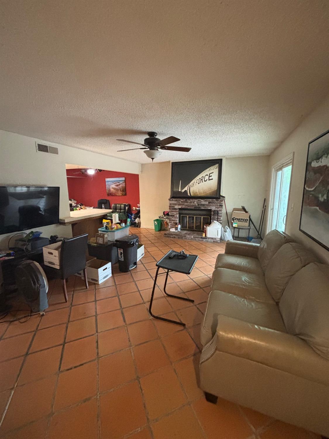 1225 Pontiac Avenue Clovis, CA 93727 - Photo 4 of 18 a living room with furniture and a flat screen tv