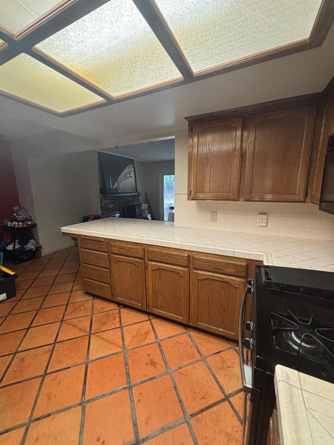 1225 Pontiac Avenue Clovis, CA 93727 - Photo 9 of 18 a bedroom with a bed and a cabinets