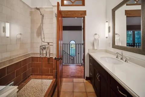 a view of door with wooden floor