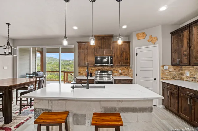 a view of living room with furniture and window