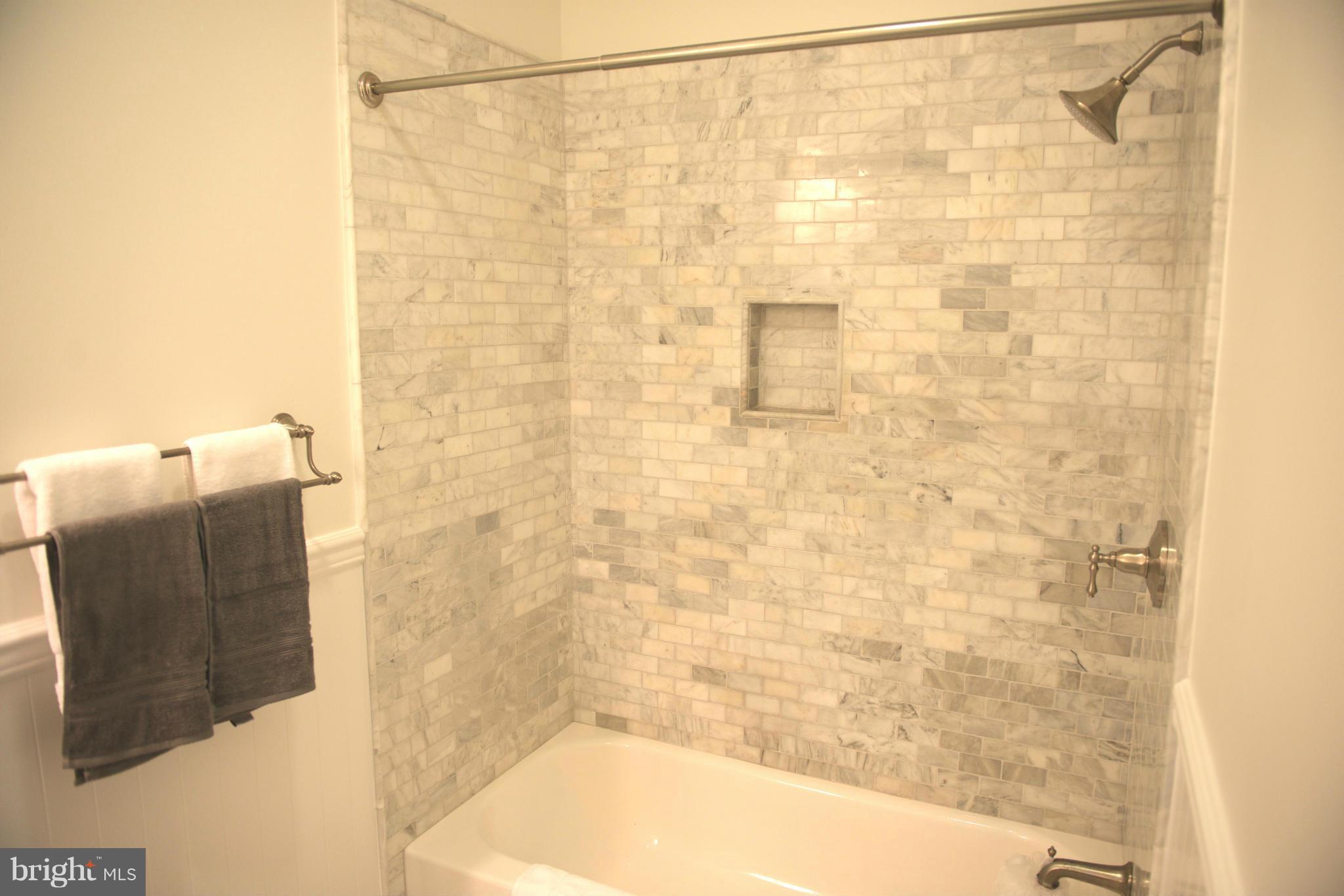 612 4th Street Northeast Washington, DC 20002 - Photo 18 of 28 a bathroom with a shower