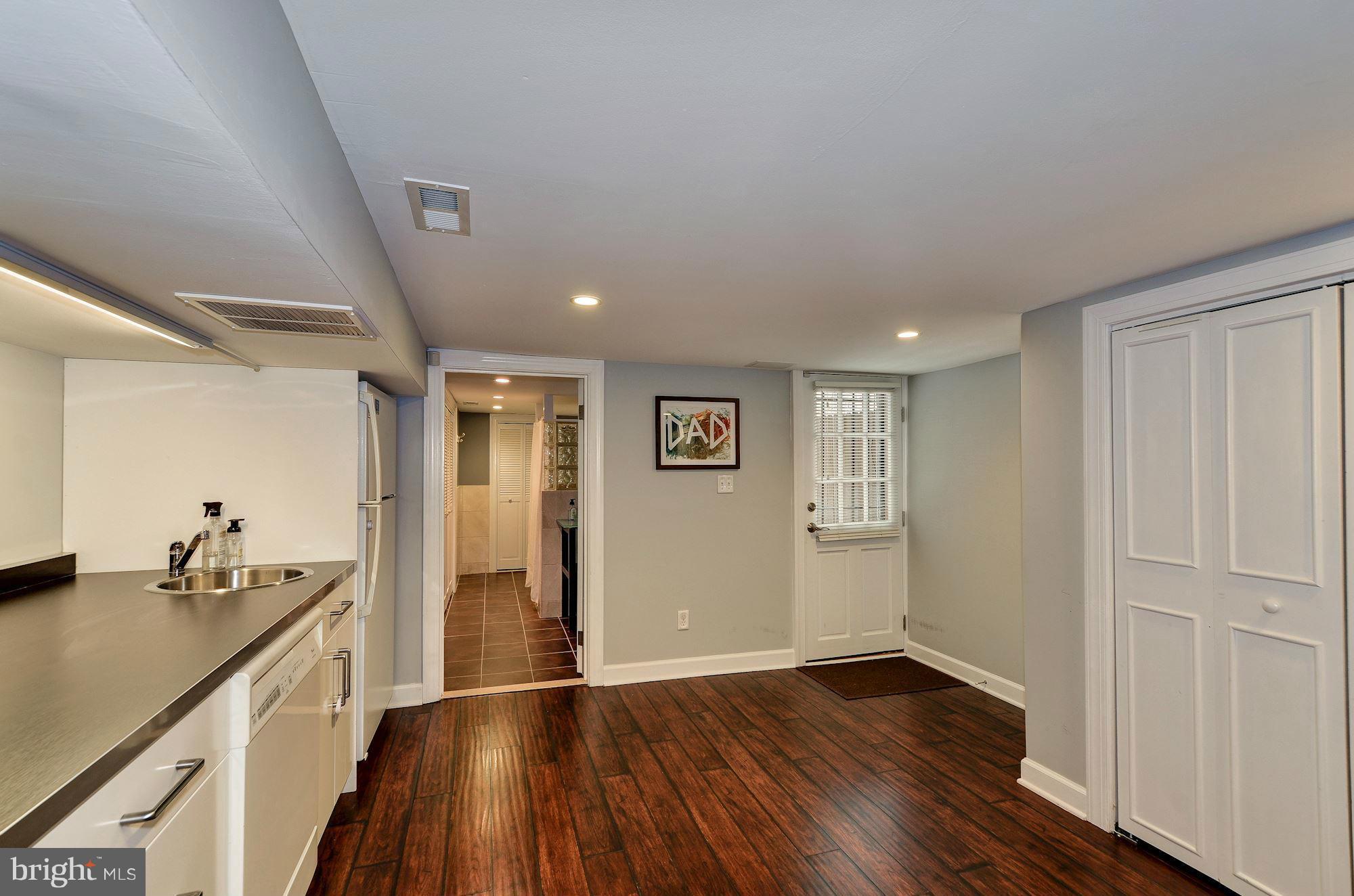 612 4th Street Northeast Washington, DC 20002 - Photo 24 of 28 wooden floor in an empty room with a window