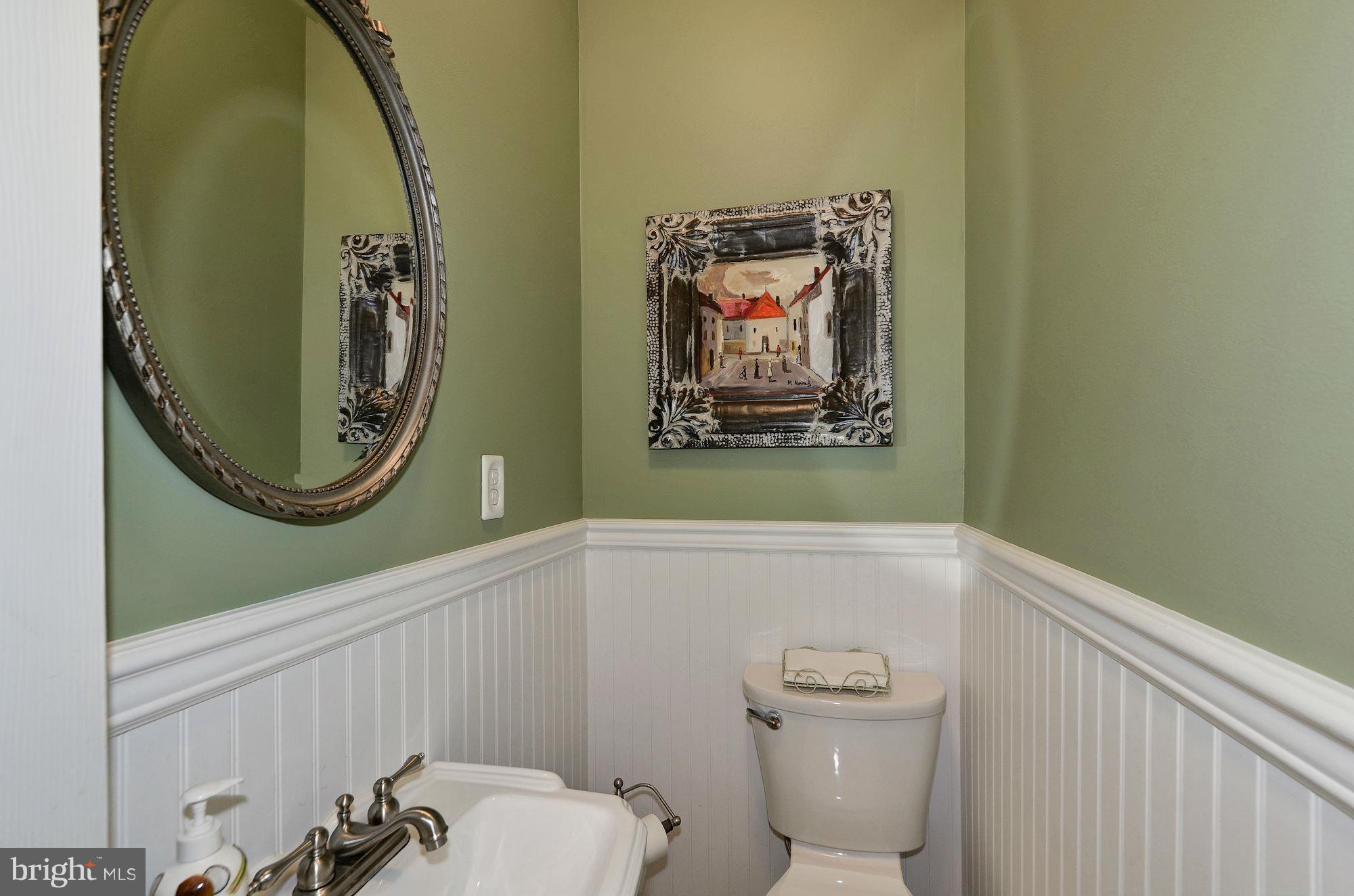 612 4th Street Northeast Washington, DC 20002 - Photo 7 of 28 a bathroom with a toilet and a sink
