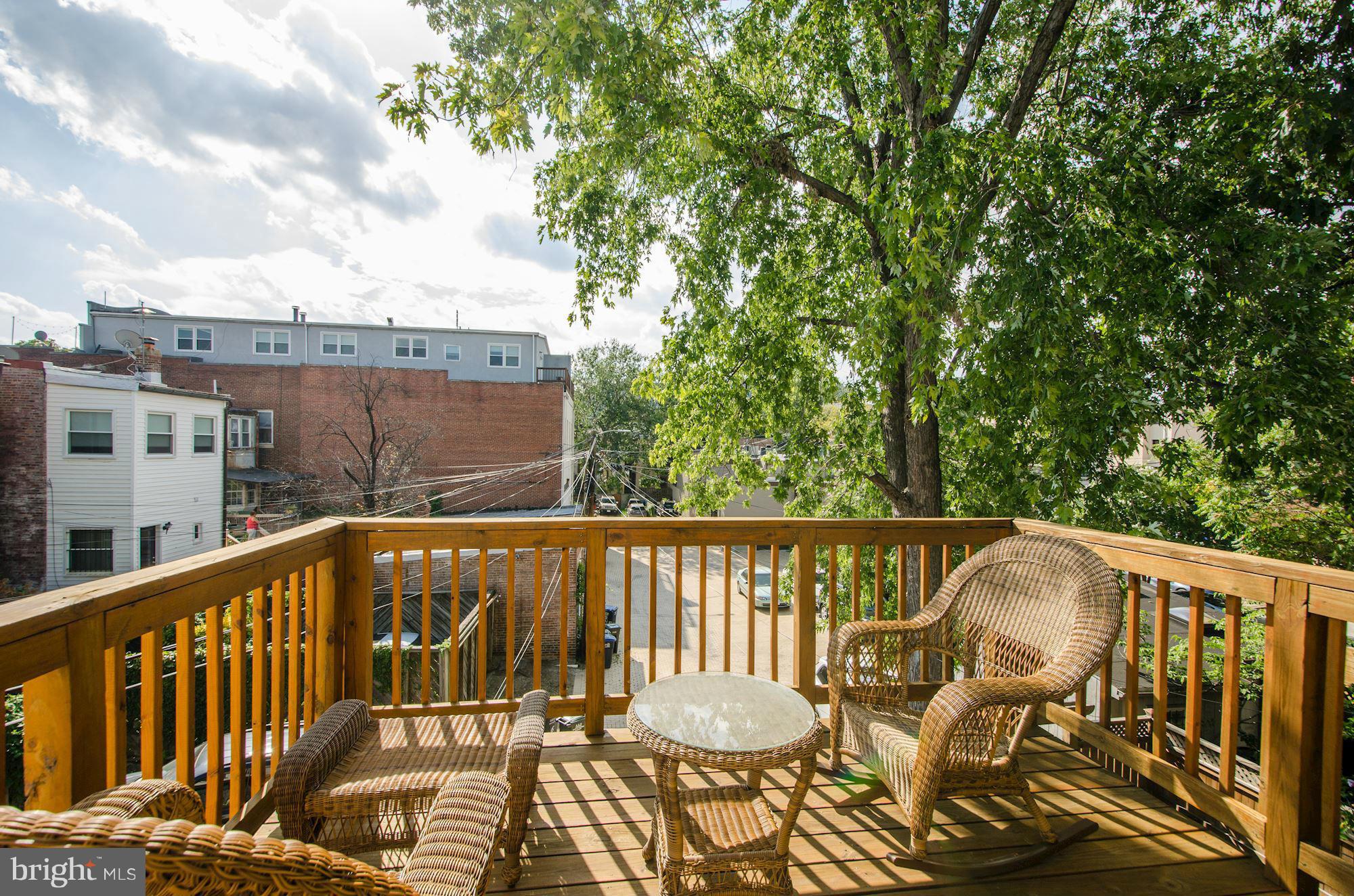 612 4th Street Northeast Washington, DC 20002 - Photo 10 of 28 a view of a two chairs in the roof deck