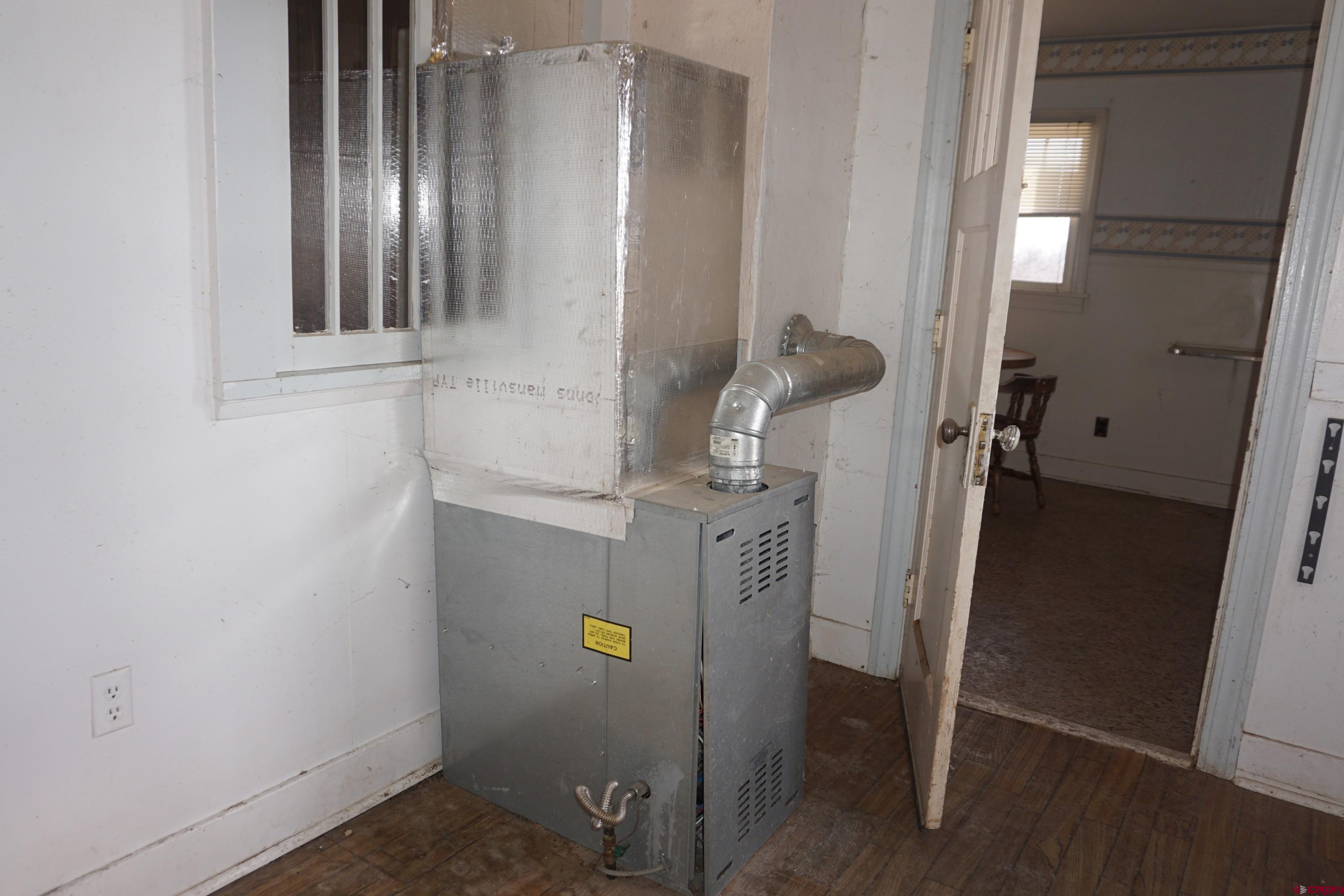 19235 2325th Road Cedaredge, CO 81413 - Photo 18 of 34 a view of water heater room