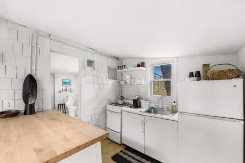 a workspace with furniture and a window