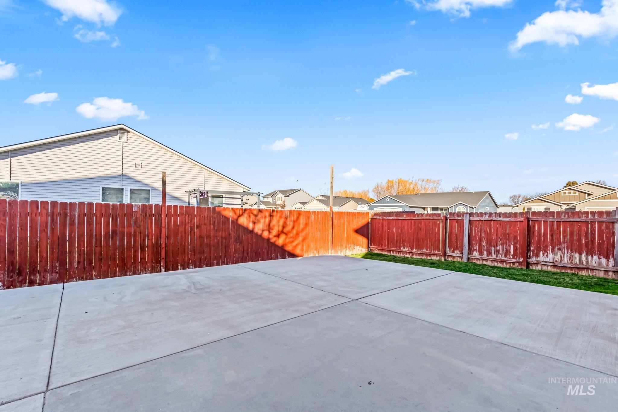 4523 Duke Street Caldwell, ID 83607 - Photo 25 of 27 Fenced backyard with a residential view