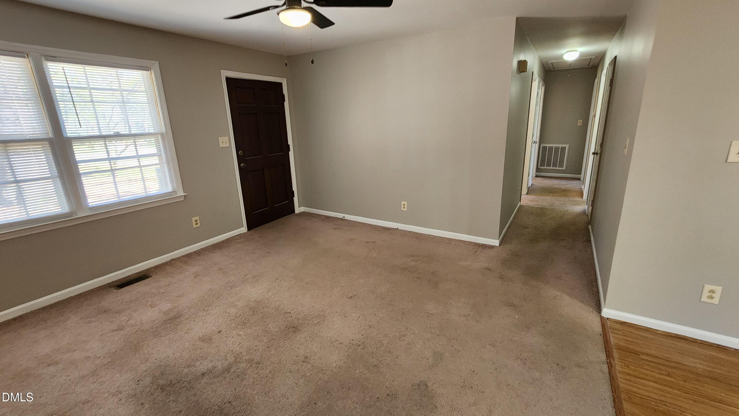 1412 Rock Drive Raleigh, NC 27610 - Photo 3 of 12 Living Room at Entrance