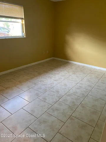 a bathroom with a toilet a sink and a mirror