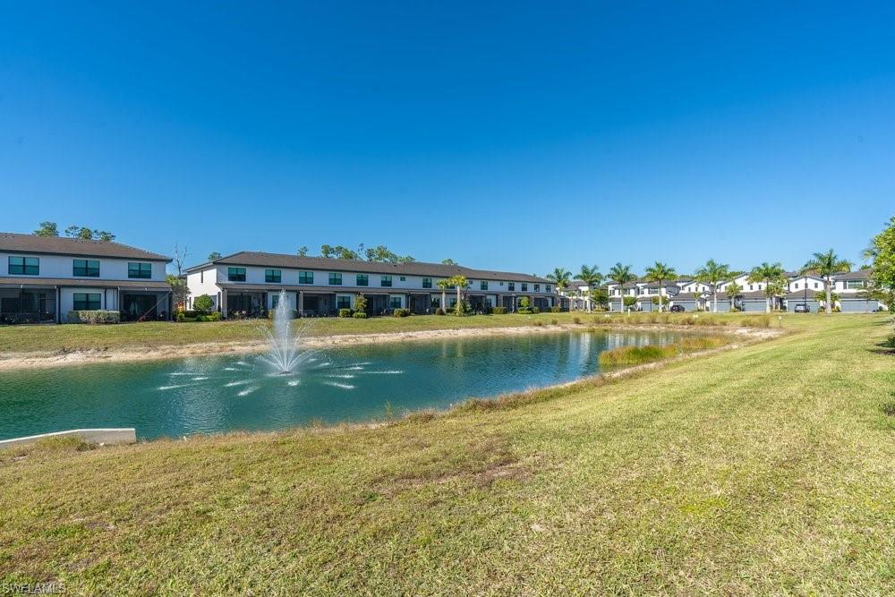7565 Carnegie Way Naples, FL 34119 - Photo 29 of 50 Water view featuring nearby suburban area