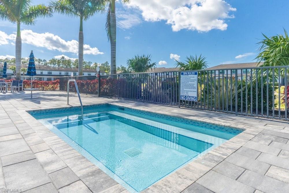 7565 Carnegie Way Naples, FL 34119 - Photo 48 of 50 hot tub in pool area