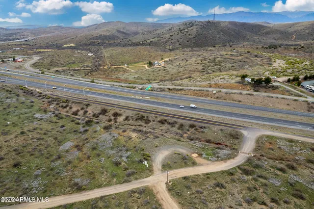 a view of a yard from a balcony