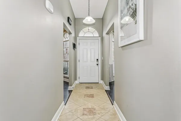 a view of a hallway with entryway