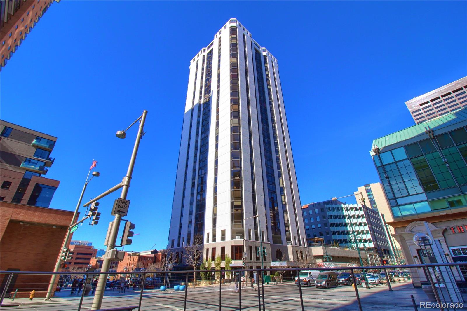 1625 Larimer Street, Unit 3104 Denver, CO 80202 - Photo 1 of 31 a view of a building with lot of windows and plants